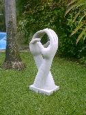 Magnificent sculpture of massaging hands at 2 Janbal Street.