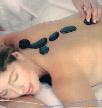 Stone massage at Daintree Massage, Wonga Beach.